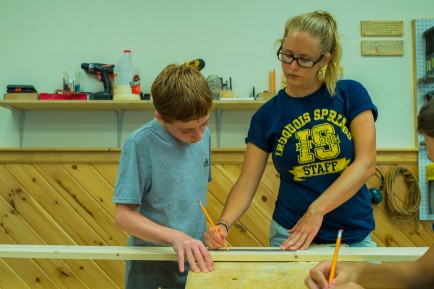 boy-instructor-wood-shop